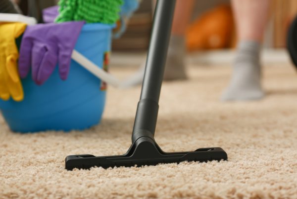 Cleaning Carpet with Vacuum and Tools